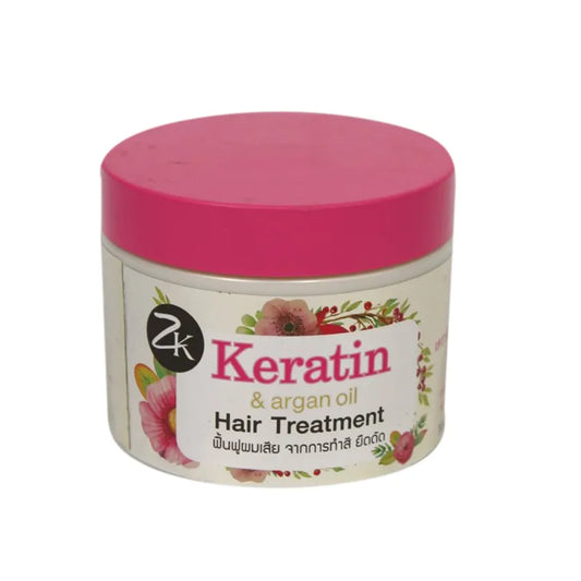 Keratin hair treatment with argan oil in a pink container, designed to nourish and revitalize hair.