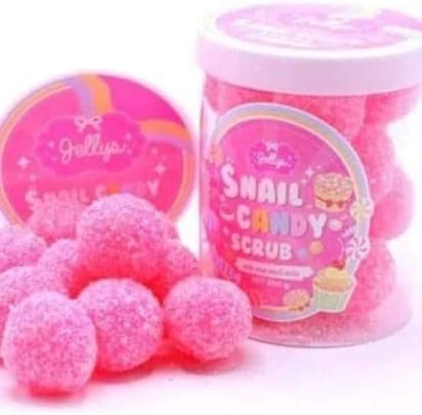 Exfoliating snail scrub for glowing skin in a pink candy-like packaging with colorful labels